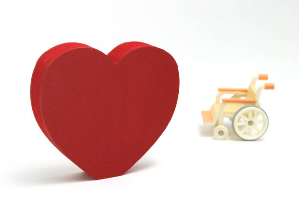 istock Heart shape and wheelchair on white background. 835776528