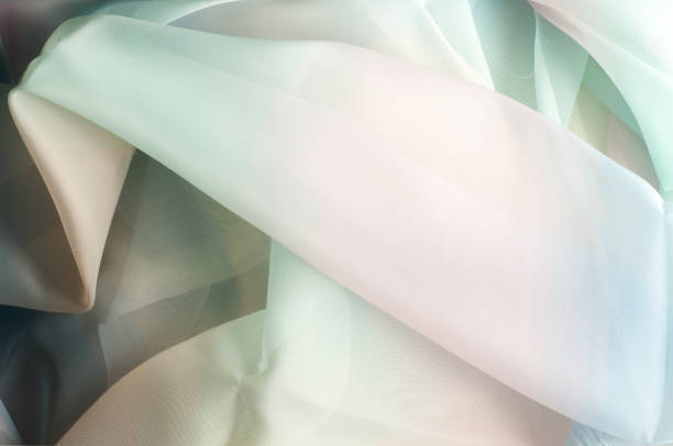 istock The texture of the silk fabric, blue light green pattern 835779146