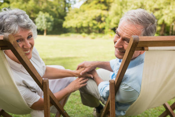 istock Happy mature couple smiling at camera 835791116