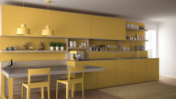 istock Minimalist modern kitchen with wooden details, table and chairs, yellow interior design 835791666