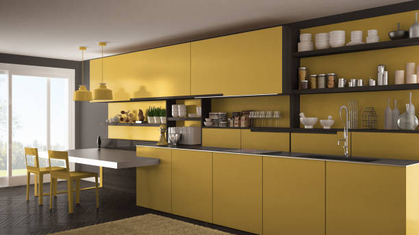 istock Minimalist modern kitchen with wooden details, table and chairs, yellow interior design 835791740