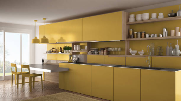istock Minimalist modern kitchen with wooden details, table and chairs, yellow interior design 835794404