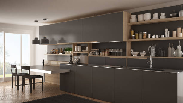 istock Minimalist modern kitchen with wooden details, table and chairs, gray interior design 835797578