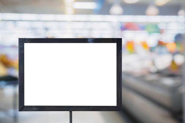 istock blank board with blur supermarket for background 835798268