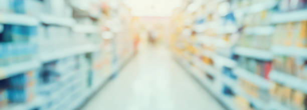 istock Empty Supermarket Aisle and Shelves in blur background 835798270