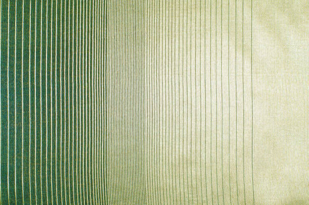 istock green silk fabric texture, salad coloring 835806238