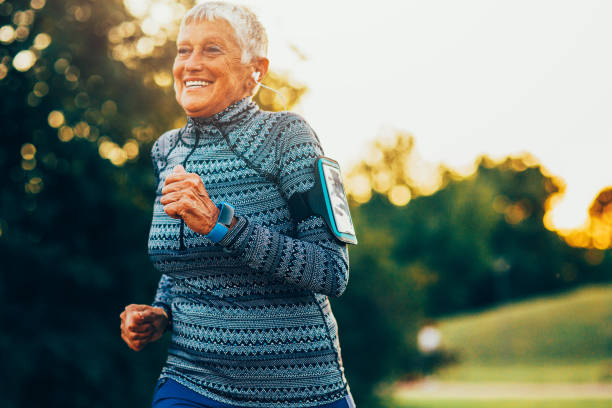 istock Senior woman jogging in the park 835807278