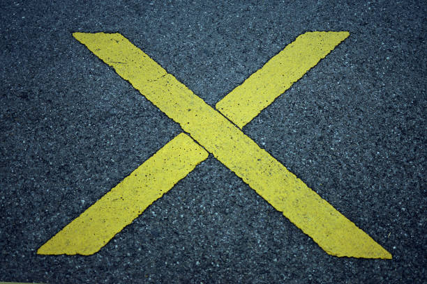 istock Asphalt marking on the ground cross 835807360