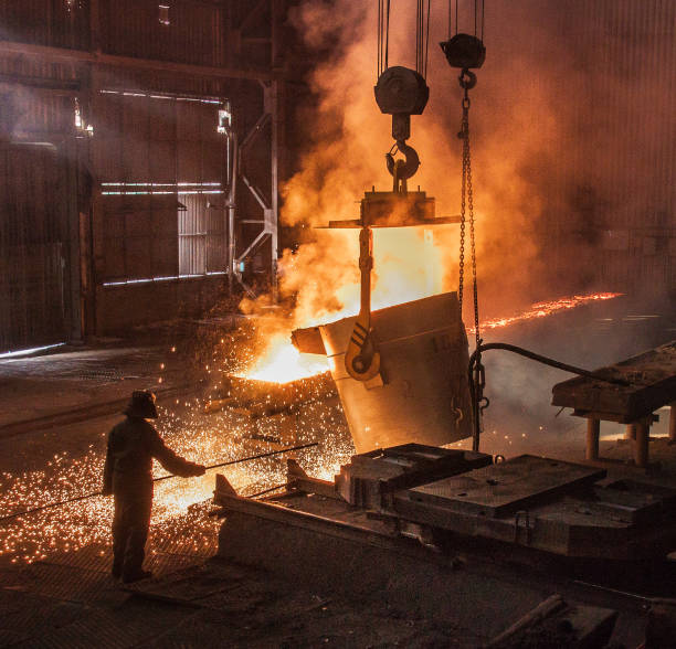 istock Metallurgist controls bottling of liquid metal 835809794