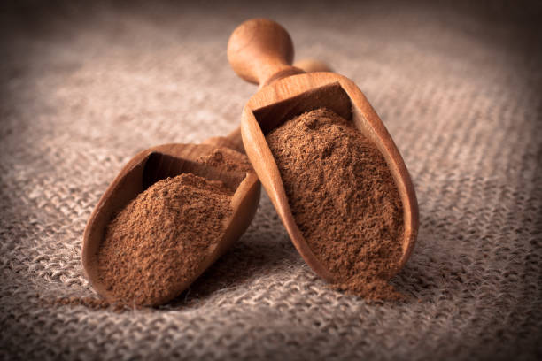 istock ground cinnamon spice powder in wooden spoon 835813672