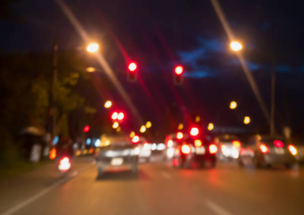 blur with bokeh lights from traffic jam on night time
