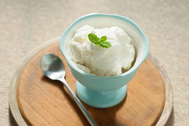 istock Ice cream in bowl and spoon 835821294