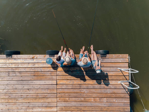 istock Family Fishing on Jetty 835821928