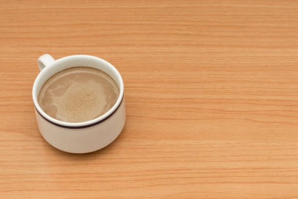 istock Hot coffee on wooden table. 835824430