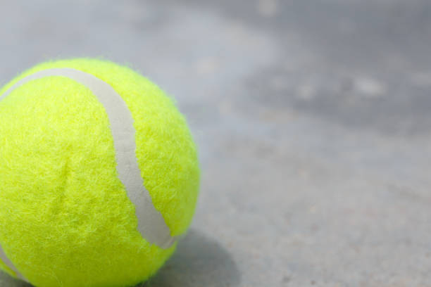 istock Tennis ball on the ground 835829140