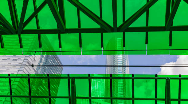 istock Skyscrapers behind green glass 835833158