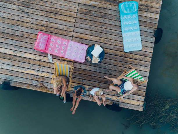 istock Friends Enjoying the Summer On Pier 835833856