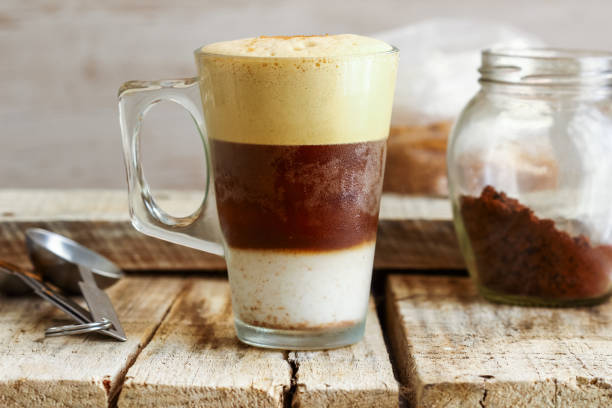 Iced Instant Coffee Refreshing summer drink  3 layered iced instant coffee. freddo cappuccino stock pictures, royalty-free photos & images