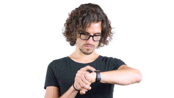 istock Man with Curly Hairs and Glasses Using Smartwatch 835838002