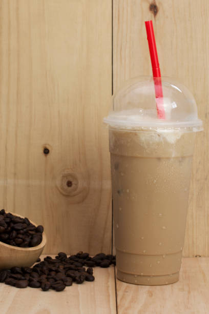 istock iced coffee on wood background 835844644