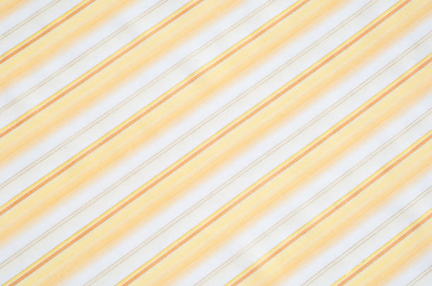 istock Cotton fabric texture, background, striped, with yellow stripes 835844782