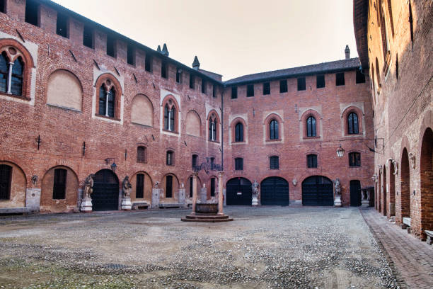 Sant'Angelo Lodigiano (Italy): medieval castle Sant’Angelo Lodigiano, Italy - June 24, 2017: Sant'Angelo Lodigiano (Lodi, Lombardy, Italy): the medieval castle, the courtyard lodi italy stock pictures, royalty-free photos & images