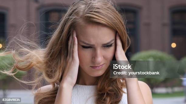 Headache Frustrated Beautiful Young Girl Outdoor Stock Photo - Download Image Now - Acting - Performance, Actor, Adult
