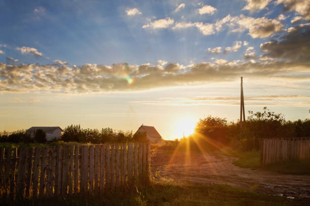 istock sunset in the village 835857462