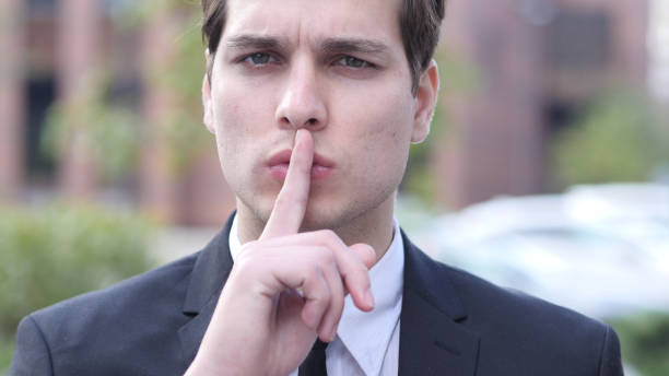 istock Gesture of Silence by Young Businessman 835857638