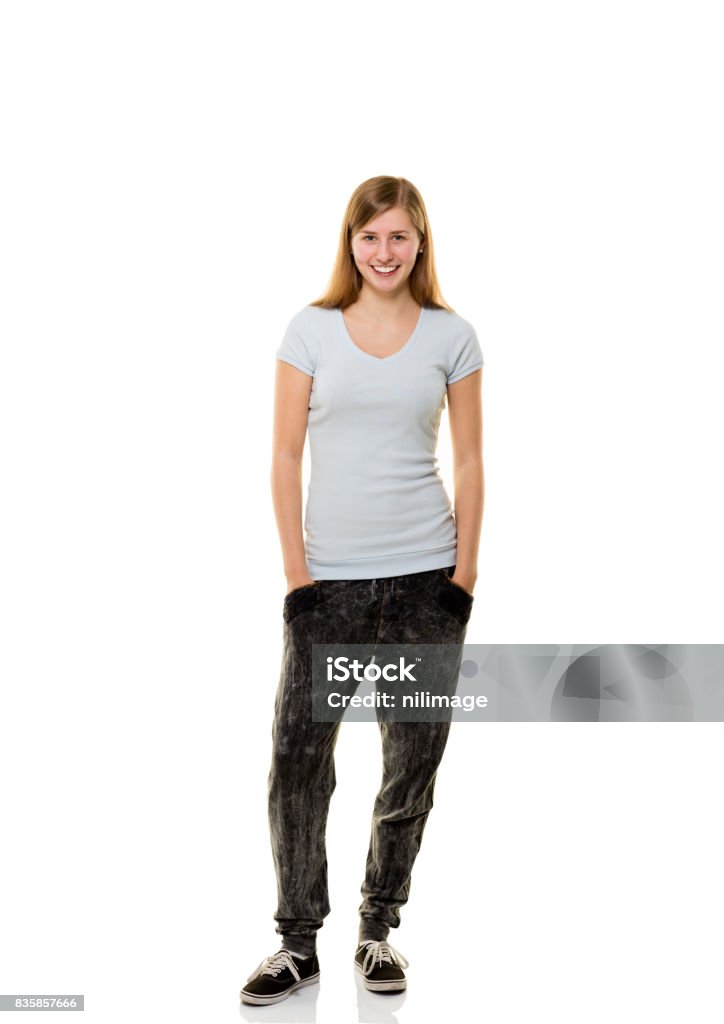 Young woman posing on white background. Full Length Stock Photo