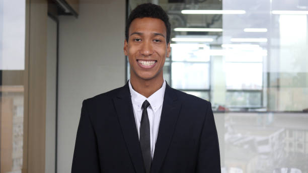 istock Smiling Businessman in Suit 835857940