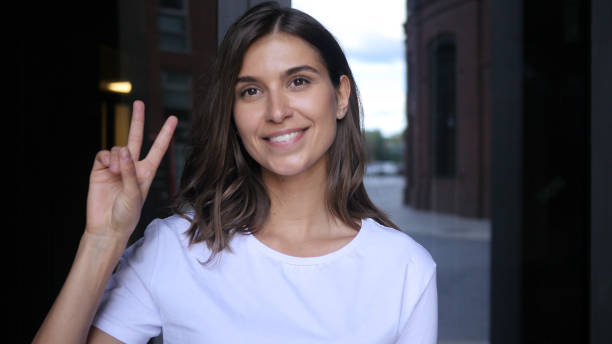 istock Victory Sign by Beautiful Female Winner 835864468