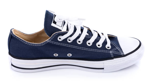 istock Classic white sneakers isolated on white background 835864602