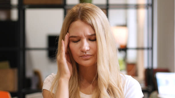 istock Headache , Frustration at Work, home , girl 835865476