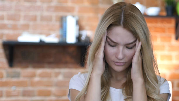 istock Headache at Work, home , girl 835865552