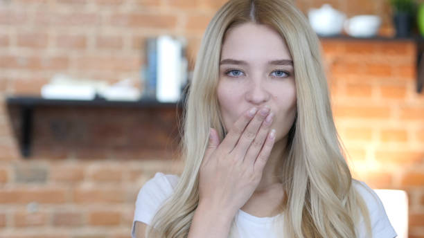 istock Flying Kiss By Beautiful Girl 835865580