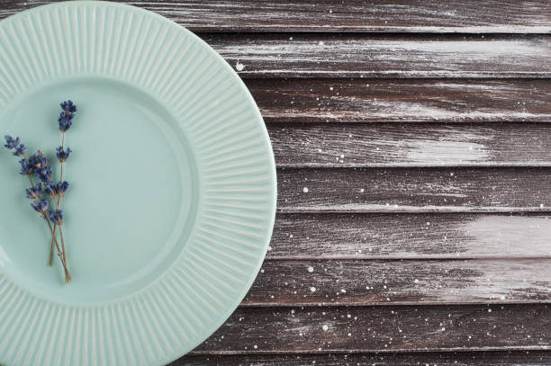 istock Blue vintage porcelain plate and lavender 835867890