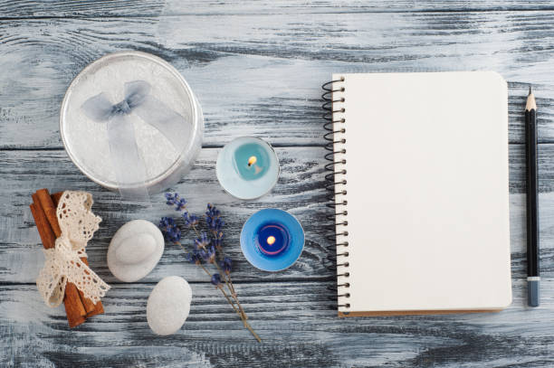 istock Notebook, lavender flowers, candles, pebble 835871258