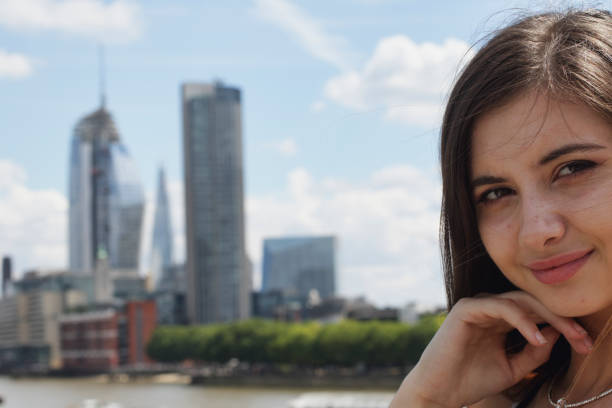Bulgarian outdoor girl teenager in London Close up of a Bulgarian teenaged outdoor girl in London, close up, with (in the background) London's Vase (One Blackfriars), 3. This photo was taken in 2017. the shard close up stock pictures, royalty-free photos & images