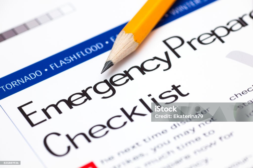 Emergency Preparedness Checklist with pencil. Emergency Preparedness Checklist with pencil. Close-up. Emergency Planning Stock Photo