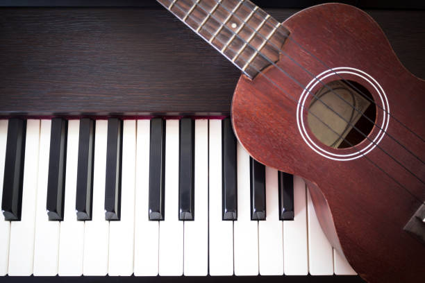 istock Piano with Ukulele. Art and Music background. Top view. 835888676
