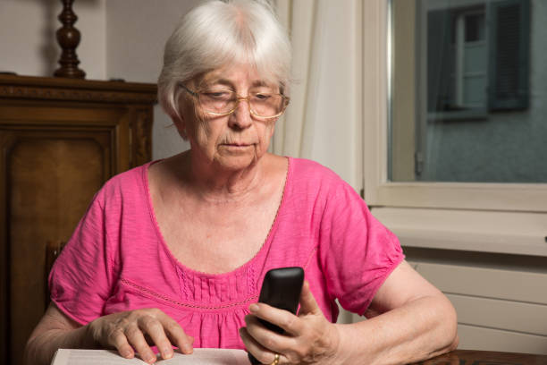 istock Senior woman using her cell phone 835889386