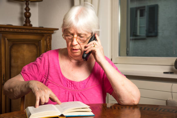 istock Senior woman using her cell phone 835889394