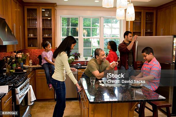 Multigenerational Family In Kitchen Stock Photo - Download Image Now - Family, Kitchen, Domestic Life