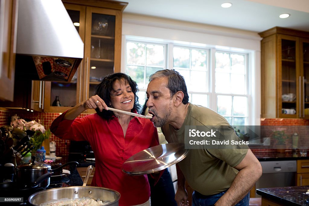 Mature couple cooking together  Cooking Stock Photo