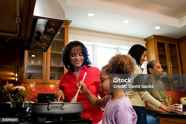 Family Cooking Together Stock Photo - Download Image Now - Family, Cooking, Latin American and Hispanic Ethnicity