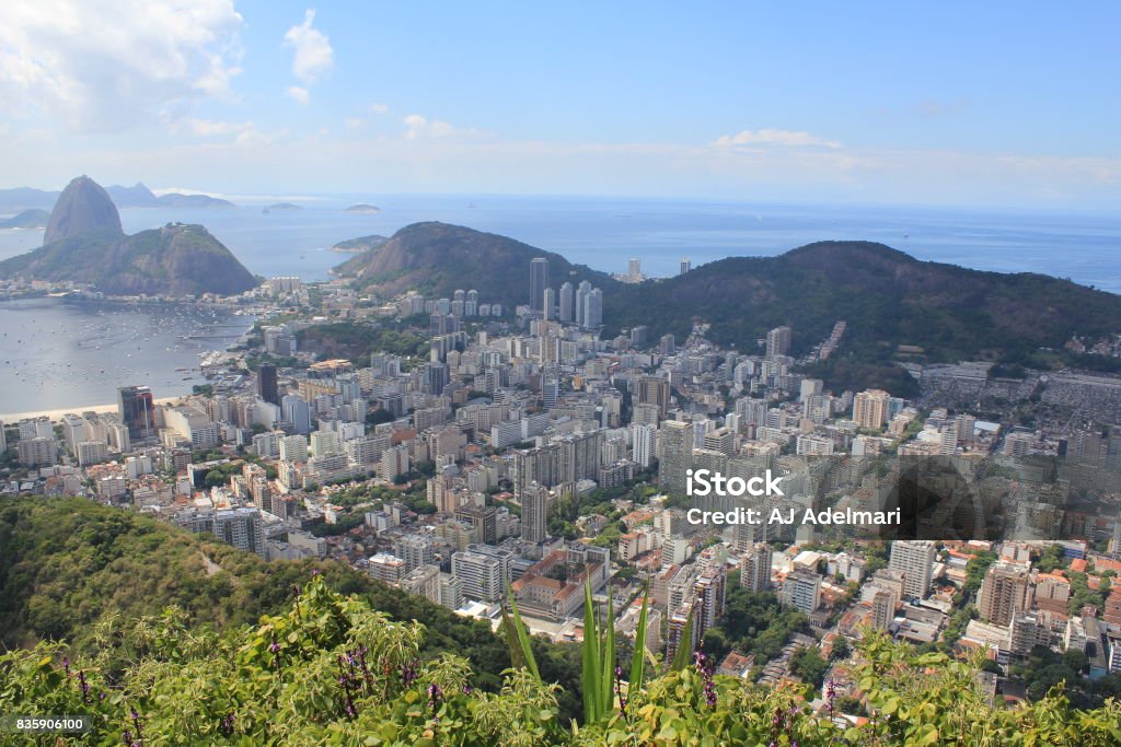 Corcovado Vista View of Urca and the coastline from Corcovado in Rio de Janeiro, Brazil, including Sugarloaf Mountain Brazil Stock Photo