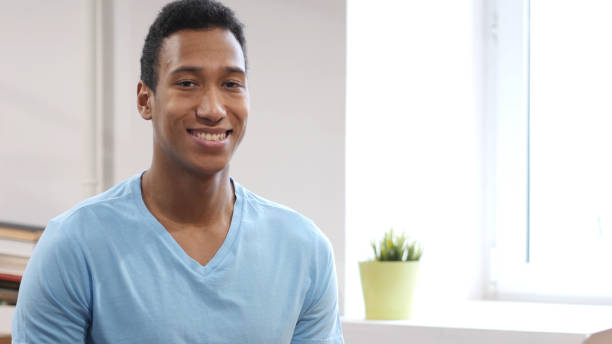 istock Portrait of Smiling Young Black Man 835910298