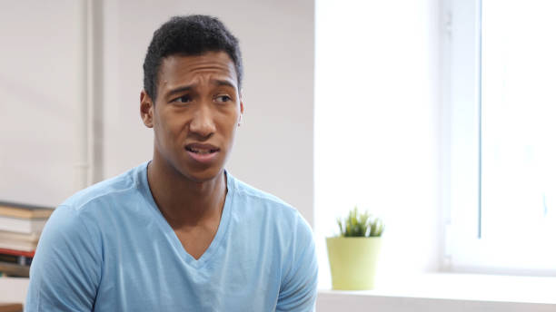 istock Portrait of Upset Sad Young Black Man 835910360