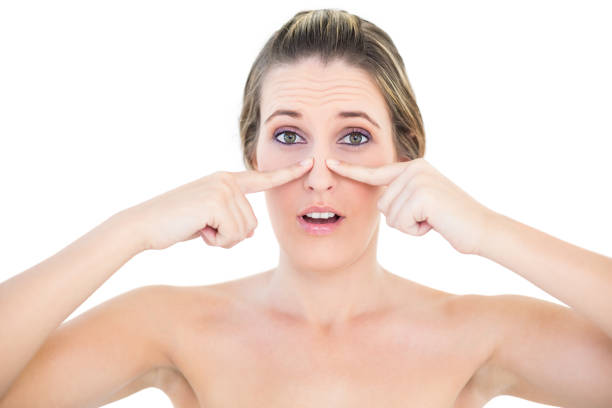 istock Shocked woman pressing blackhead on her nose 835914070